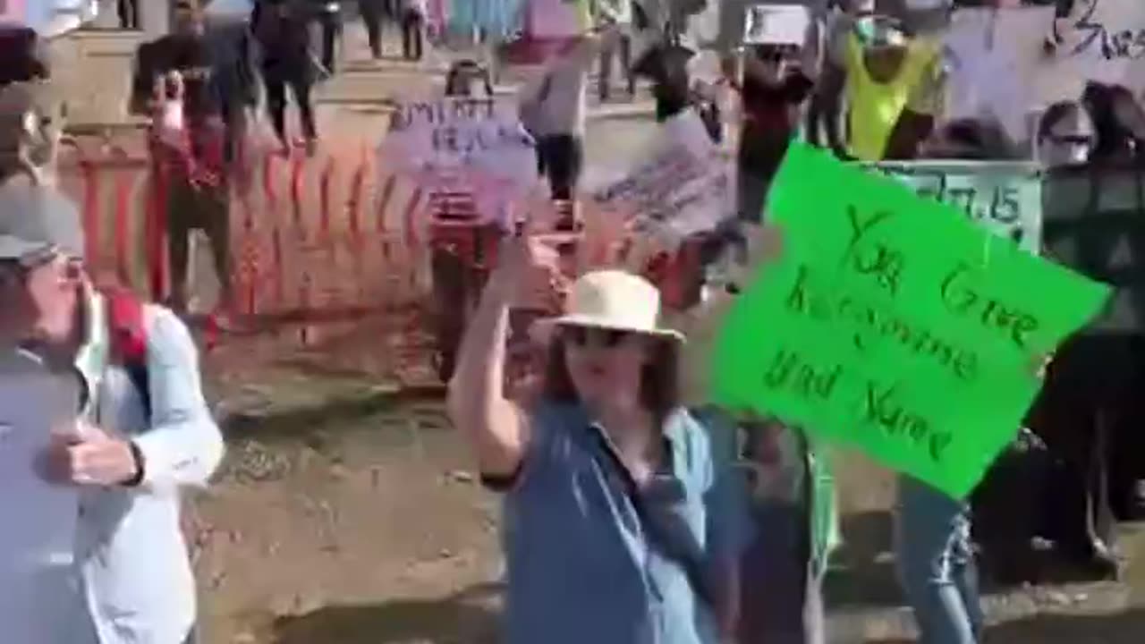 Alex Jones just drove up to a TESLA Dealership