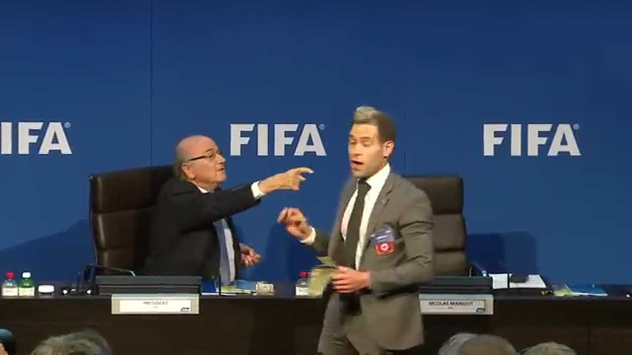 The moment Sepp Blatter was showered with FAKE Dollar billls