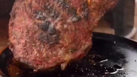 The delicious steak, very juicy and think, with a medium rare cook