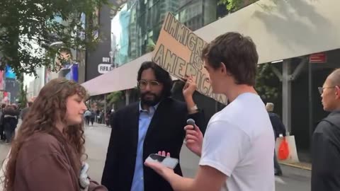 Protestor couple disagrees on deportation of illegal immigrants, awkward