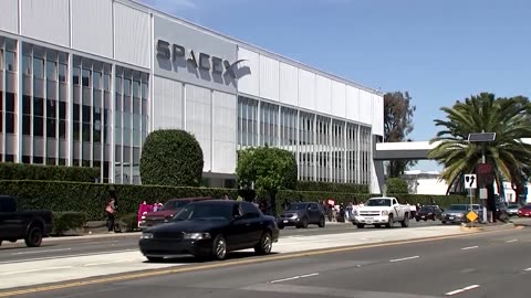 Protesters rally outside SpaceX headquarters against federal cuts