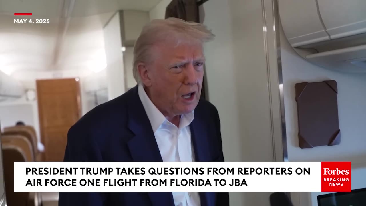 Trump speaks to Reporters on AF1 returning to DC