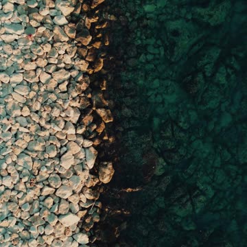 Stunning Aerial View of Rocky Beach Coastline