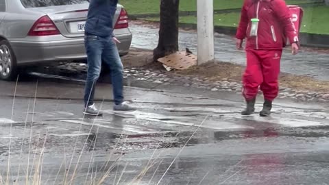 Men Hug After Arguing in Traffic