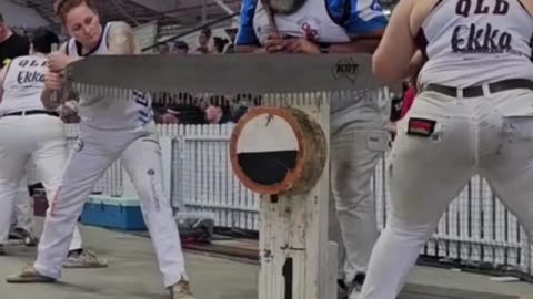 Tree log cutting competition for ladies! 💪🌲 They make it look so effortless, but is it really? 🤔🔥