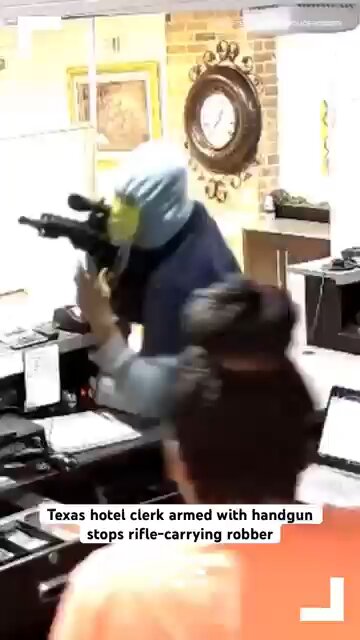 Rifle Carrying Robber Forced to leave by an Clerk with a handgun