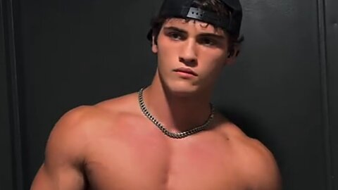 20 years old bodybuilder flexing muscles