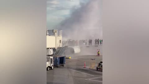 Chaos in Denver: American Airlines Plane Catches Fire, Passengers Escape Onto Wing!