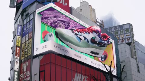 In Japan, billboards are a spectacle in themselves, and this one is no exception.