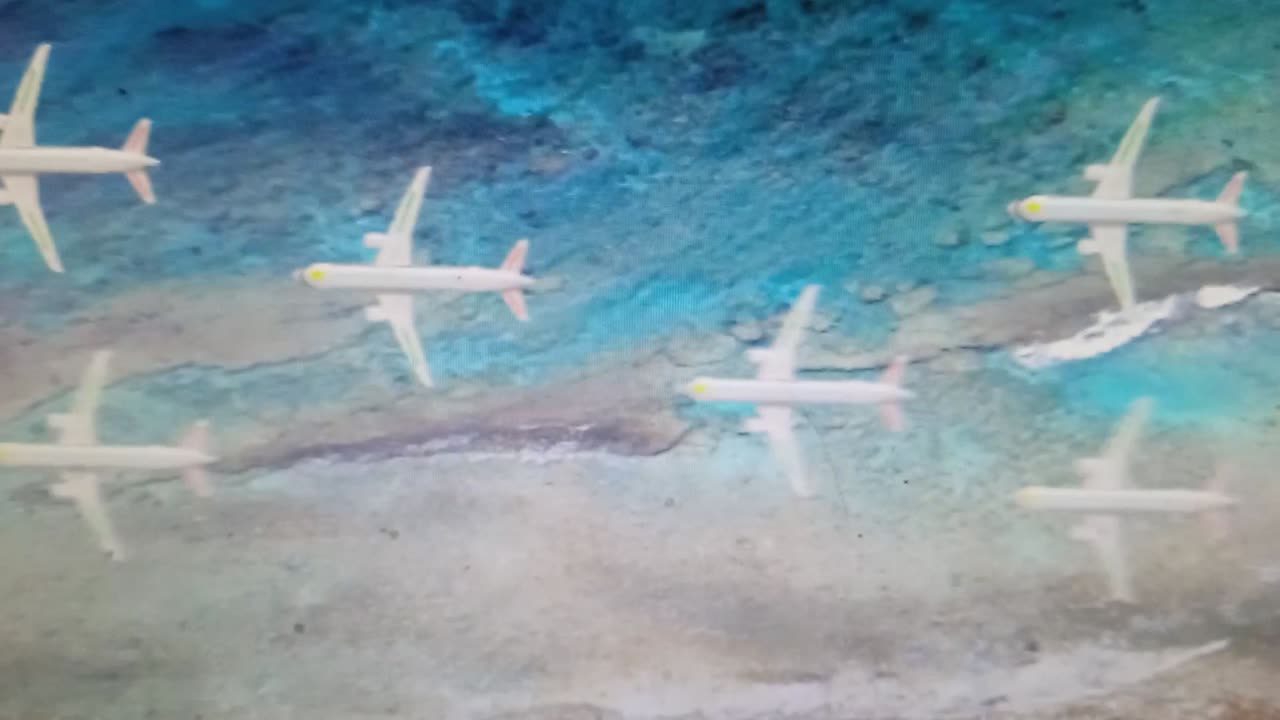 aero planes are flying above the sea
