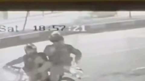 During the protests in Iran, video footage shows regime forces on a motorcycle spotting