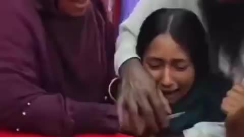 A young girl in Pakistan forced to sign a marriage contract with...