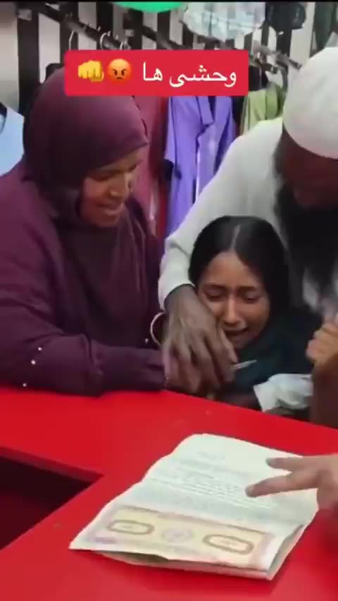A young girl in Pakistan forced to sign a marriage contract with...