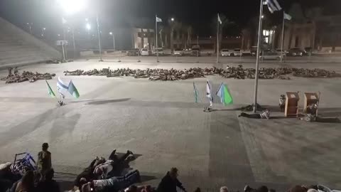 Israeli settlers lie on the ground as Yemen's ballistic missiles reach the occupied territories