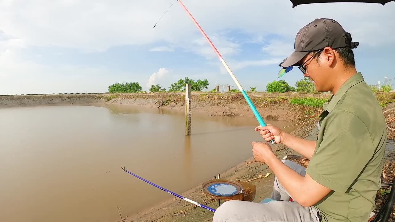 Tilapia Net Casting in Warm Lake Tributaries
