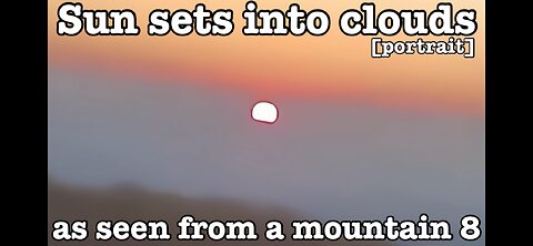 Sun sets into clouds as seen from a mountain 8 [portrait]