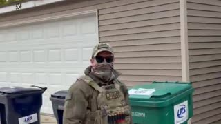 A Karen yells and screams at DHS agents who kind look on at her like she is an animal in the zoo.