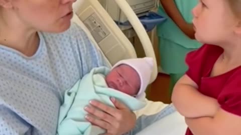 Toddlers meeting newborn Hilarious