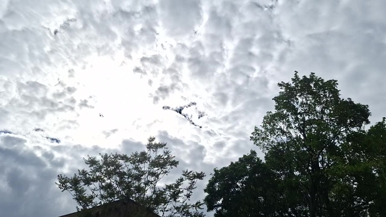 "Clouds"(not real, fake)blocking the direct light from the white sun(blue hue) and yellow sun 6/1 4:35pm