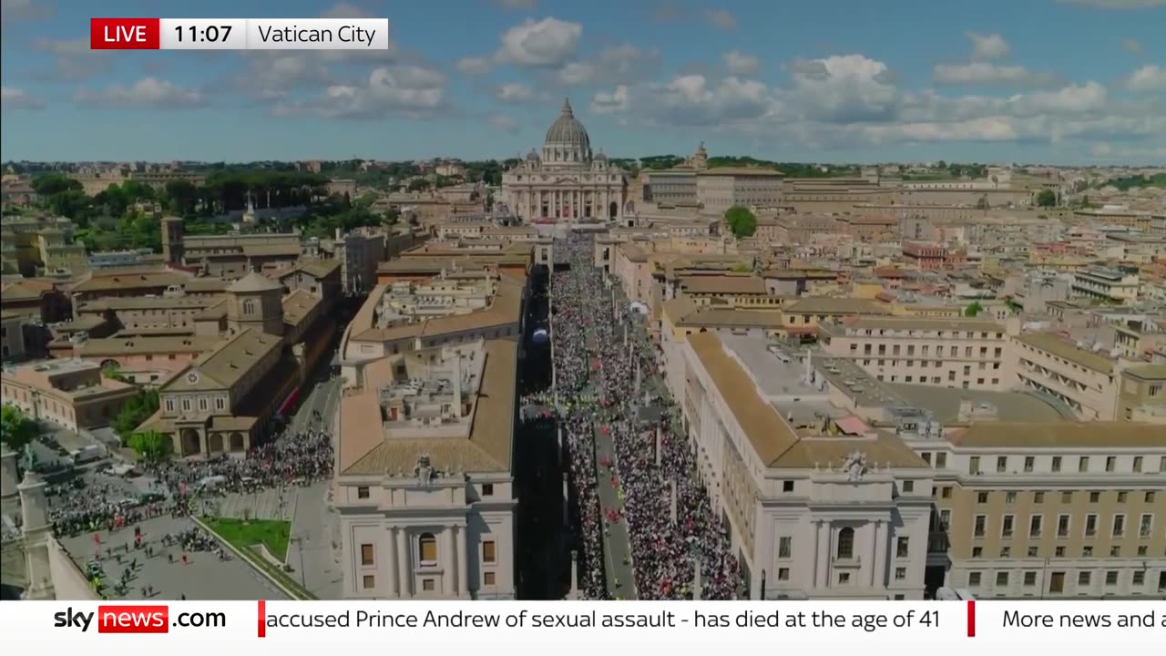 Crowds line streets for funeral