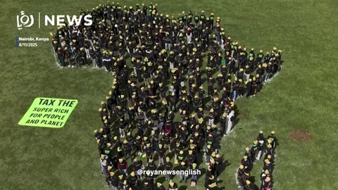 Greenpeace volunteers create giant human Africa map for wealth tax campaign