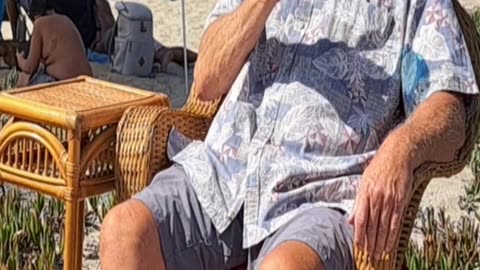 Even his shadow has a tan.