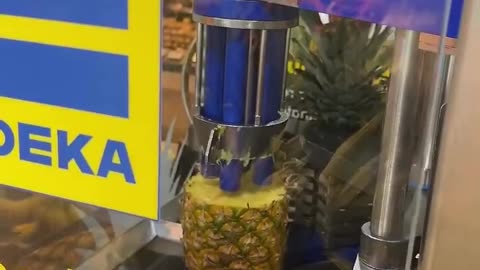 Pineapple-cutting machine at the Edeka Germany