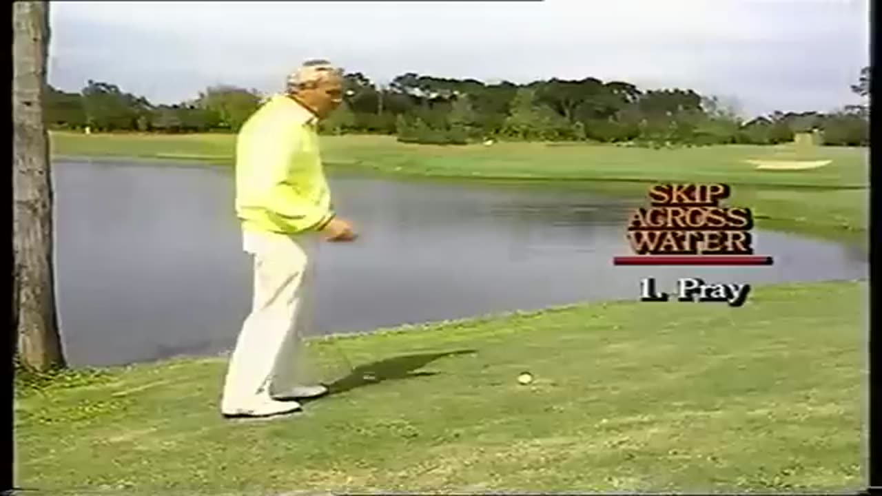 Arnold Palmer attempts the water shot