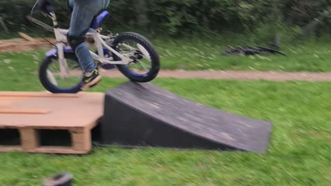 Kid Faceplants Off Bike Jump