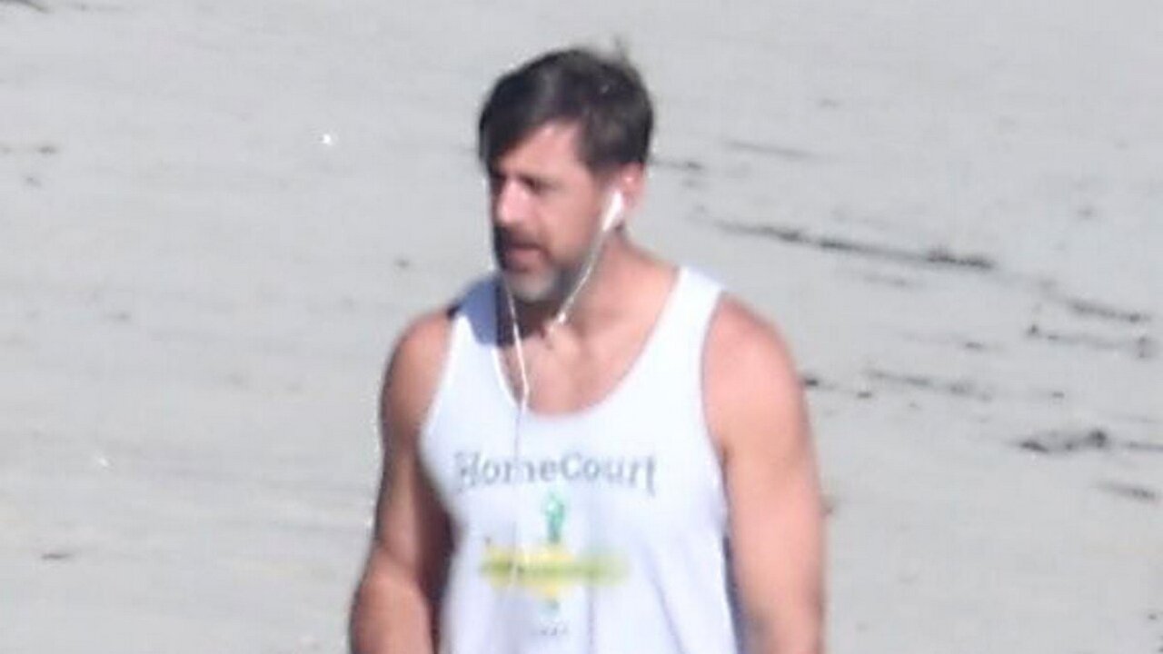 Aaron Rodgers Fuels ‘Fake Marriage’ Rumors After Solo Beach Stroll in Malibu