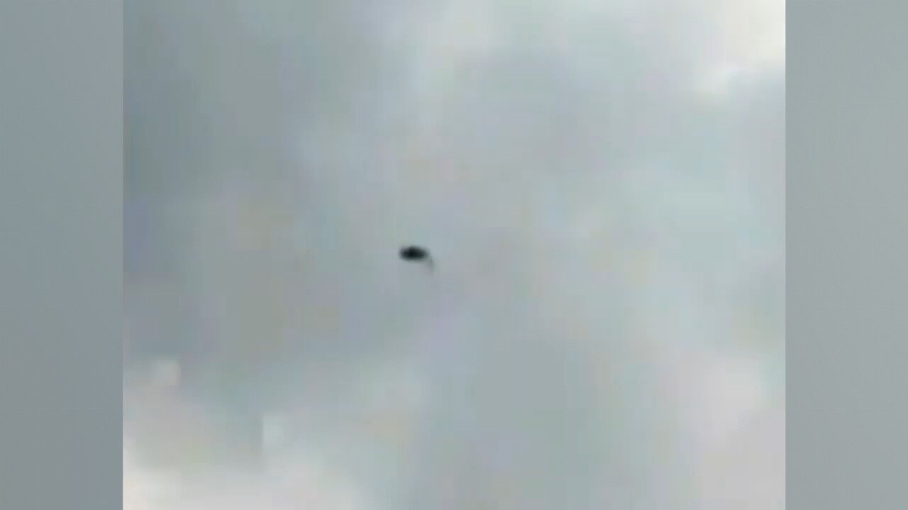 UFO Sits Still in Sky