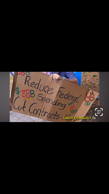 Musk Protester Contradicts with Own Sign.