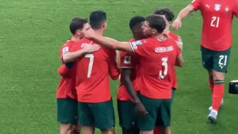 The Portugal national team and Cristiano Ronaldo celebrate scoring a goal ⚽