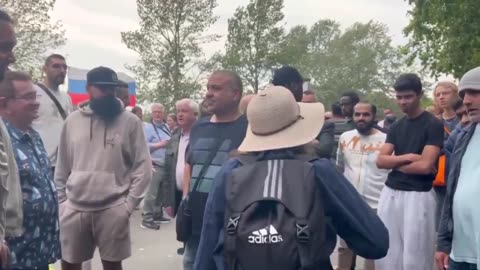 British national screams at Muslim men.