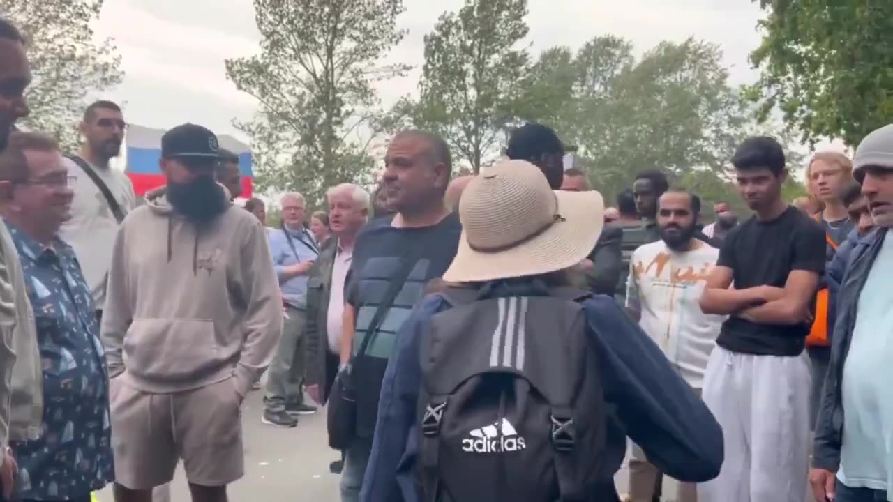 British national screams at Muslim men.