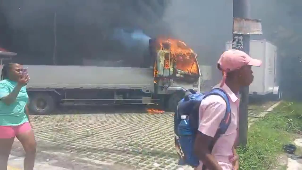TUSCHEN, GUYANA - Protesters set fire at hotel after child missing since Wednesday