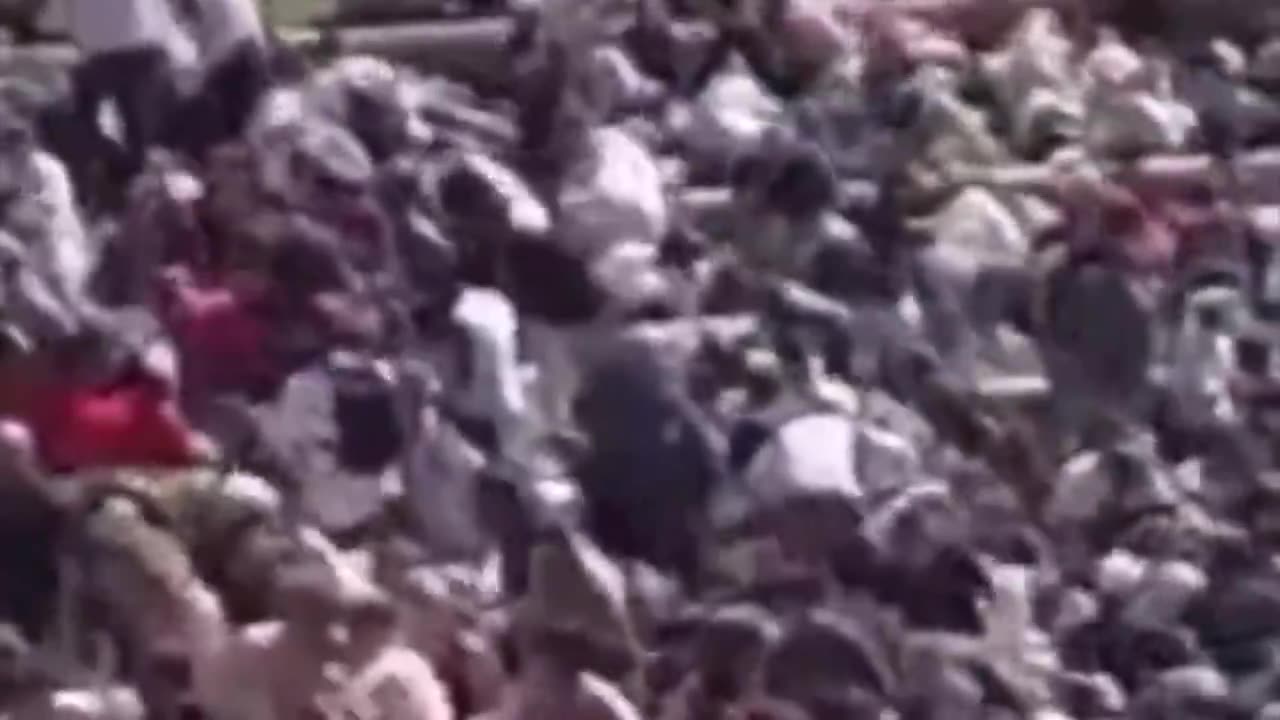 WATCH as George Zinn in the crowd appears to set something down…