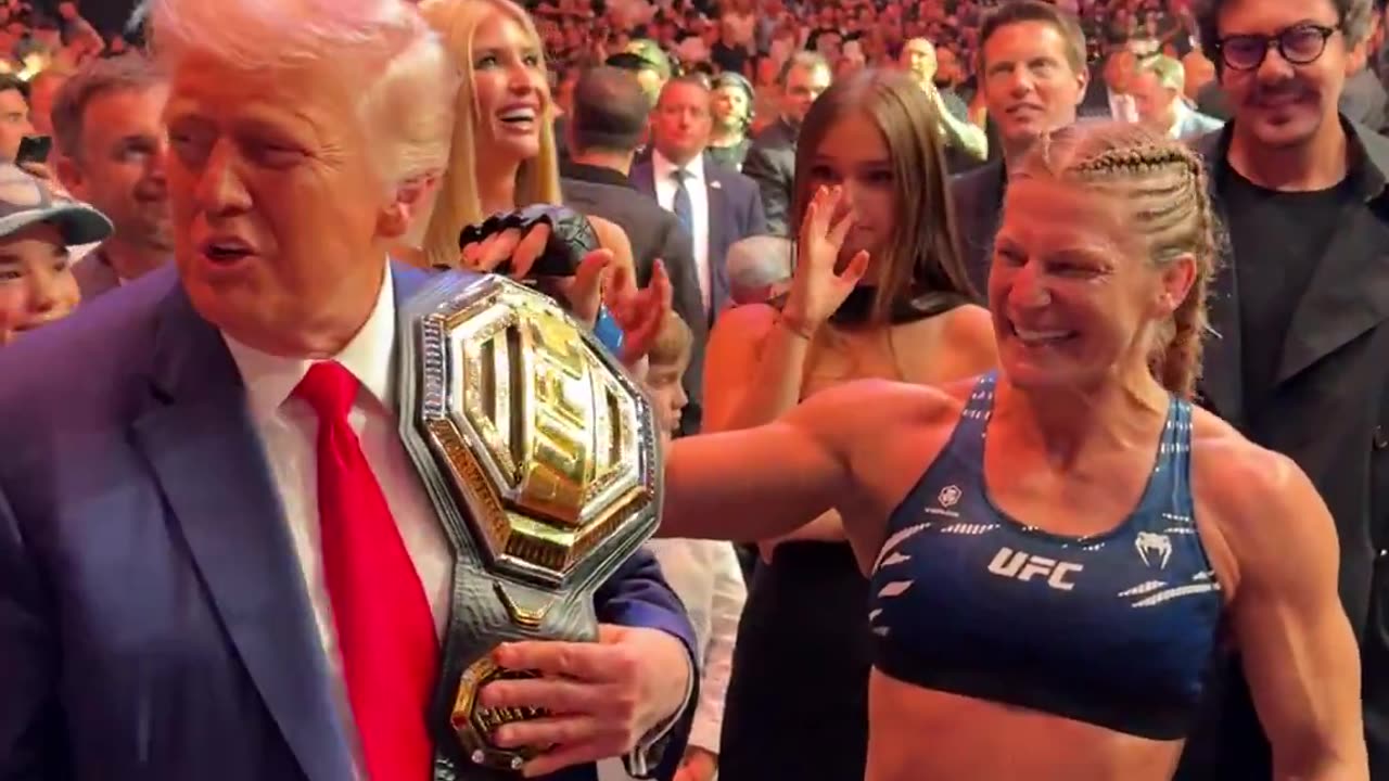 UFC woman's champ hands Trump the belt at UFC 316