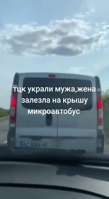 A woman climbed onto the roof of the TCC van