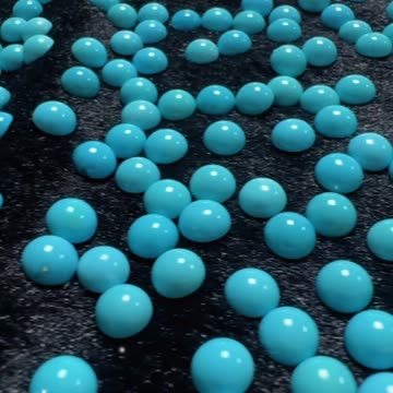 20250626-3 Sleeping Beauty Turquoise Cabochon: Deep-Sea Blues Gem on Fingertips