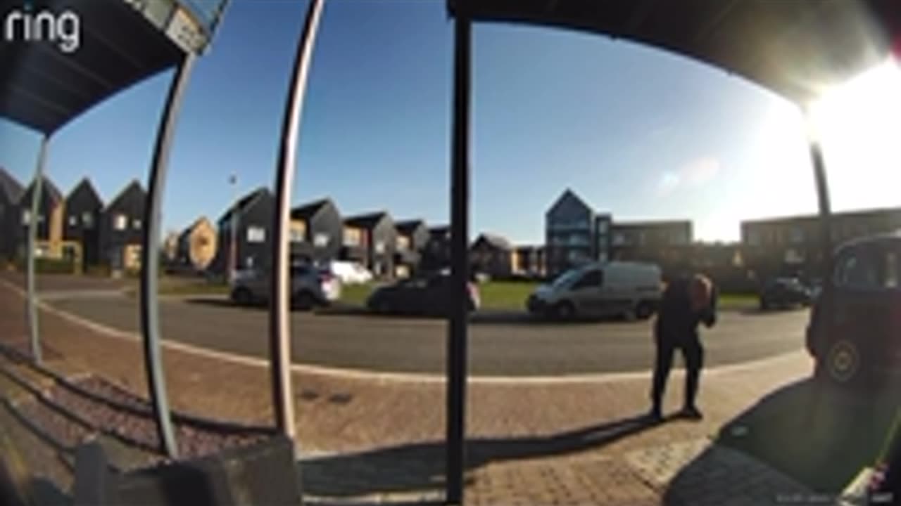 Distracted Man Walks Face-First Into Metal Pole