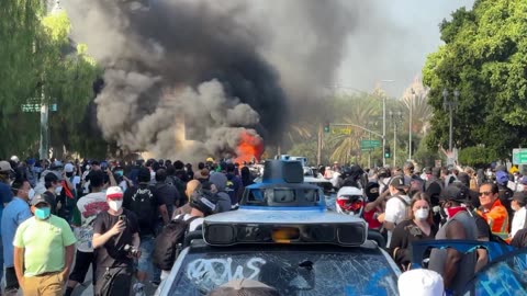 WATCH: Rioters set Waymo vehicle on fire in Los Angeles, California.