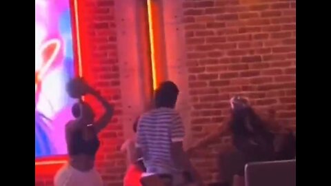 Woman throws bowling balls at woman's head, bowling alley fight