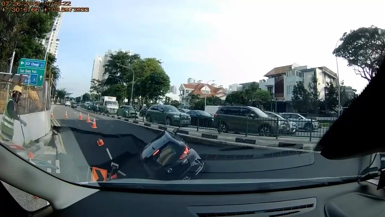 Car Plunges Into Sinkhole in Singapore After Ignoring Construction Warnings