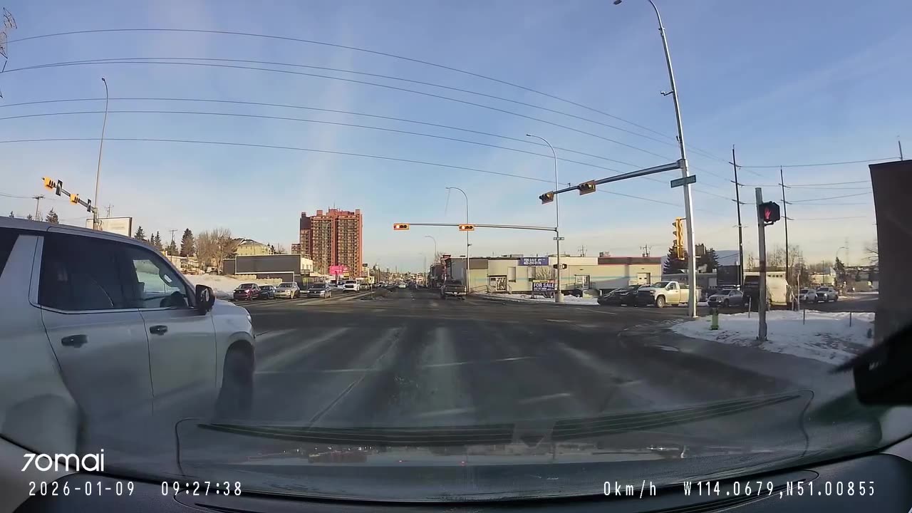 Apparent Red Light Runner Meets Conveniently-Placed Cop