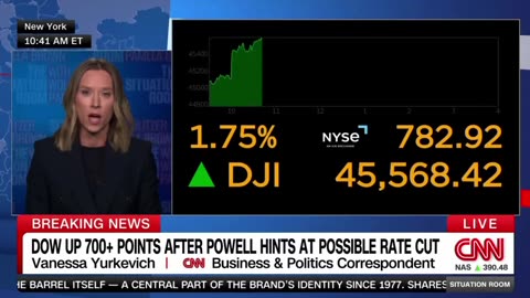 Federal Reserve Chairman Jerome Powell hints at a possible rate cut in September.
