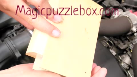 Finding Ferrari Portofino M key in a puzzle book box on the engine F154