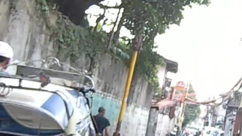 Into the Narrow Alley on Gov. A. Pascual Street in Navotas City in the Philippines