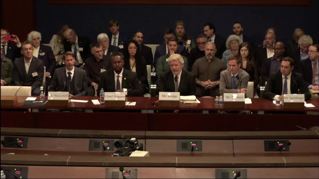 UAP hearing, military surveillance video showing a UAP splitting a Hellfire missile in mid-air.