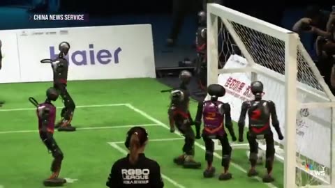 Chinese AI robots compete in first ever soccer match